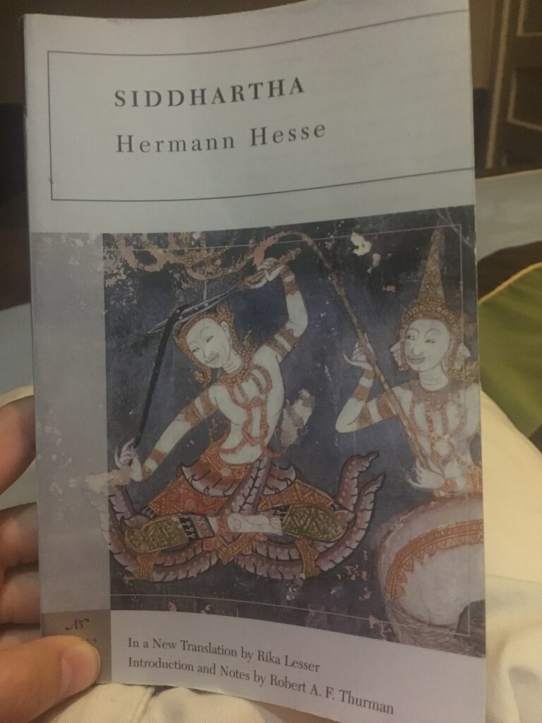david smart holding the book siddhartha by hermann hesse